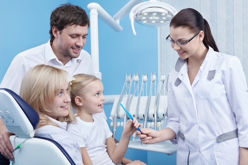 How can parents teach children the proper way to brush their teeth?