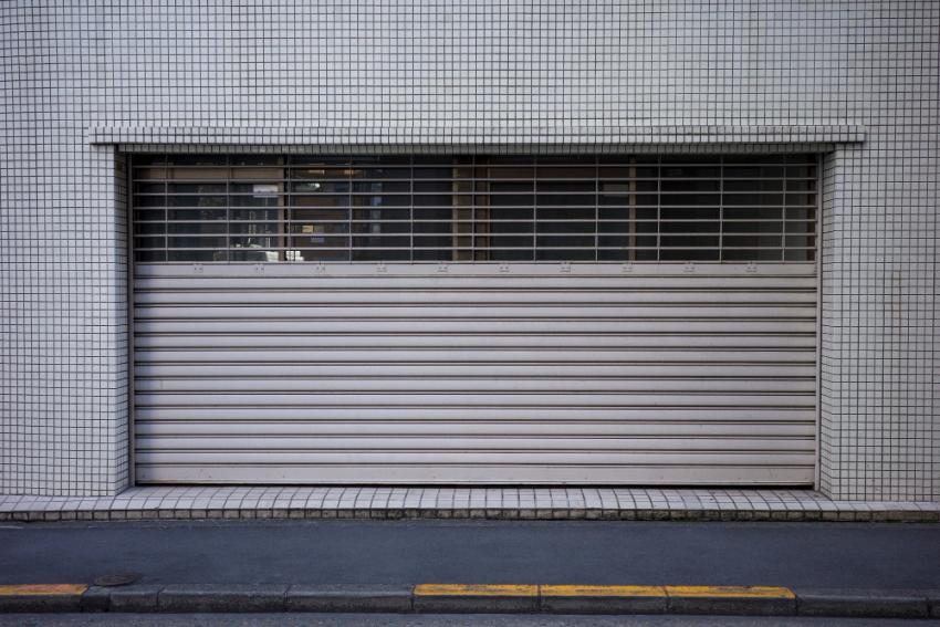 Why Coastal Alabama Homes Need Regular Garage Door Service and Repair